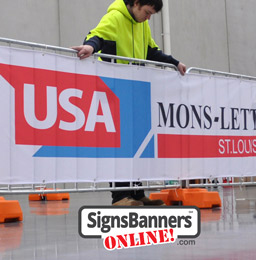 Showing the sporting barriers used at events for crowds to stand behind and watch the event