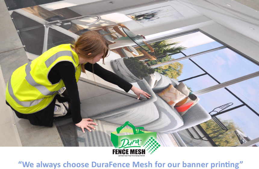 Girl pointing to the fine detail achieved when printing using the DuraFence Mesh banner printing products. Here, the scene is the interior design of a new home.