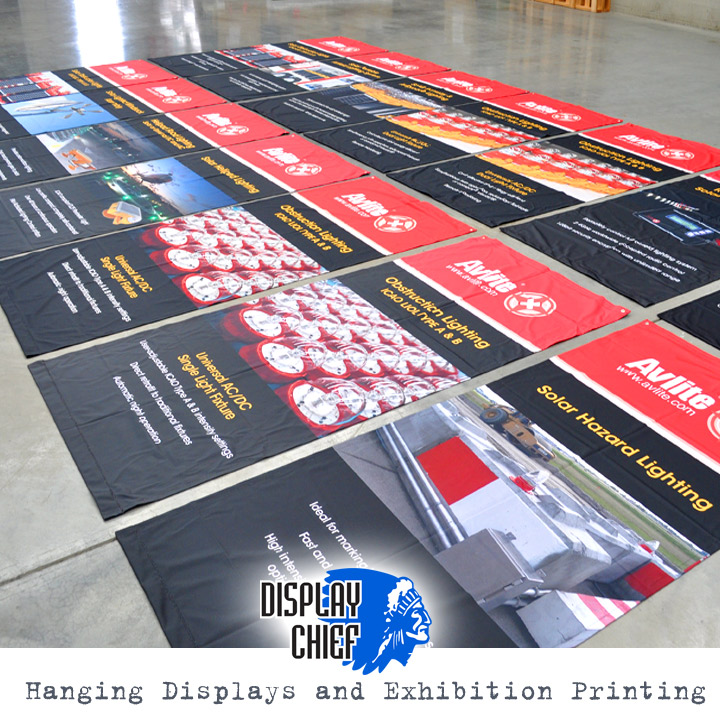 Series of hanging banner signs for display.