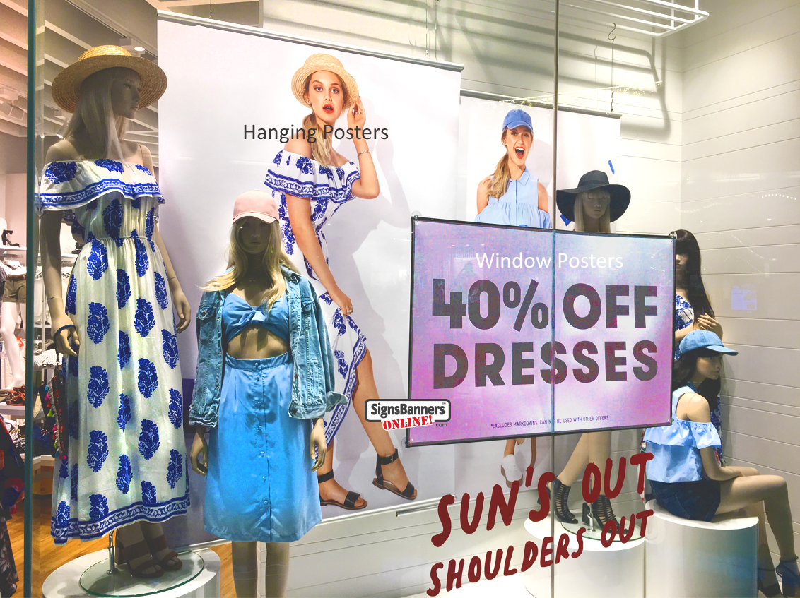 Example of both Hanging Posters and Window Posters inside the fashion retail store display
