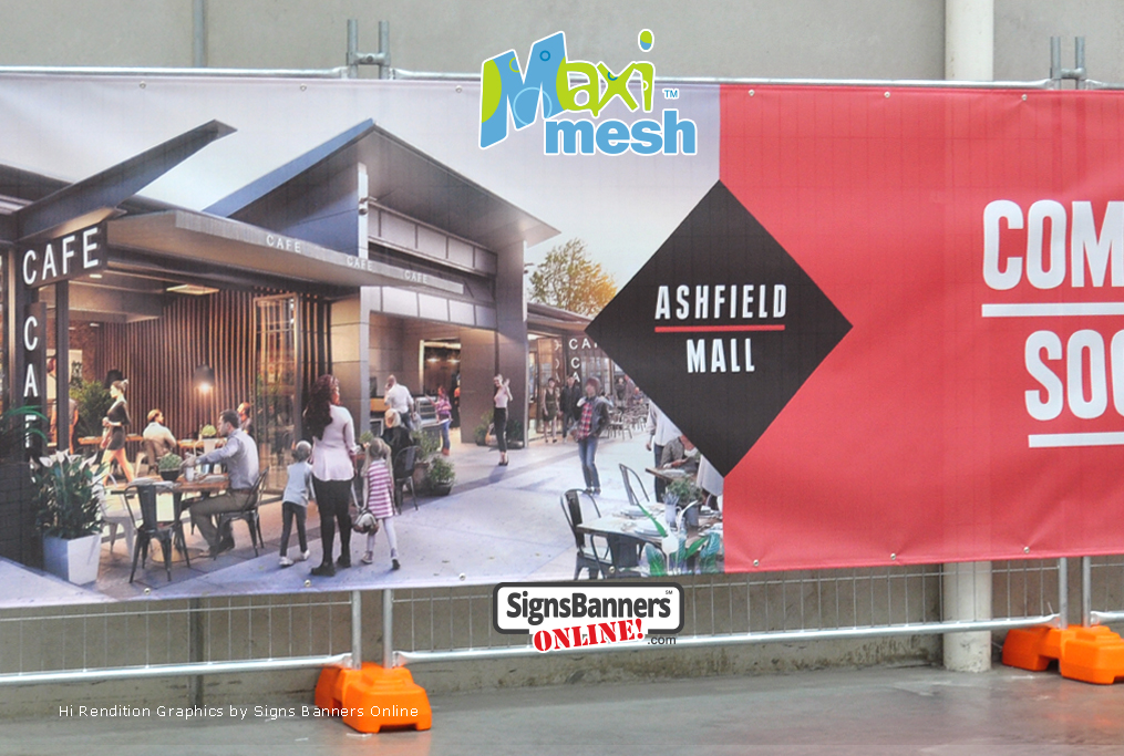 Hi-rendition graphics printed on mesh banner for mall renovation - the banner is tethered to the fence.