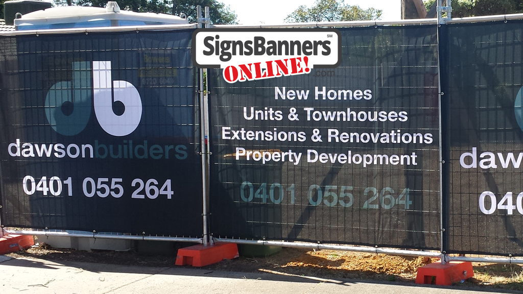 Portable banners on land fence