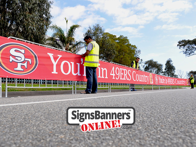 Signage on the temporary event fence covers