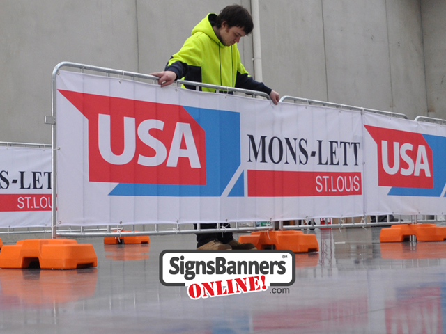 Showing the sporting barriers used at events for crowds to stand behind and watch the event