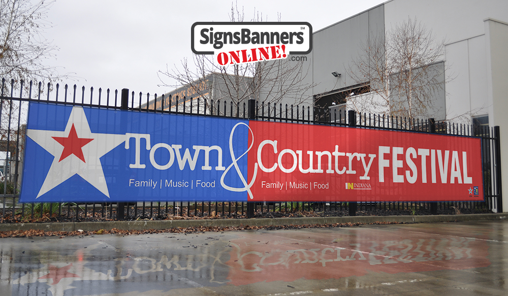 Surrounding your event perimeter early with advertising outdoor signs is clever. Big bold and bright is always best like this example for Indiana Town and Country Festival