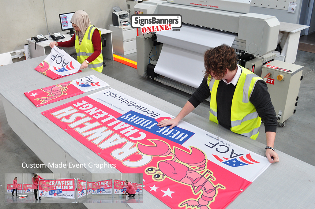 Original photo of print factory (inside) making a quantity of printed event graphics for use at events in Louisiana and South Carolina. The image shows a factory scene with work people during the final stages of wholesale banner sign supplies.