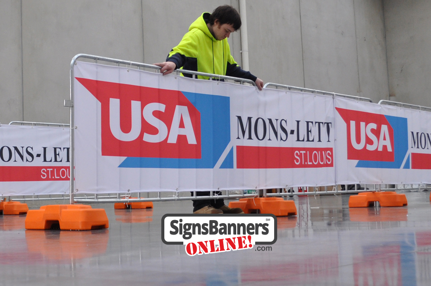 Event signage on barricades being manufactured and inspected for USA