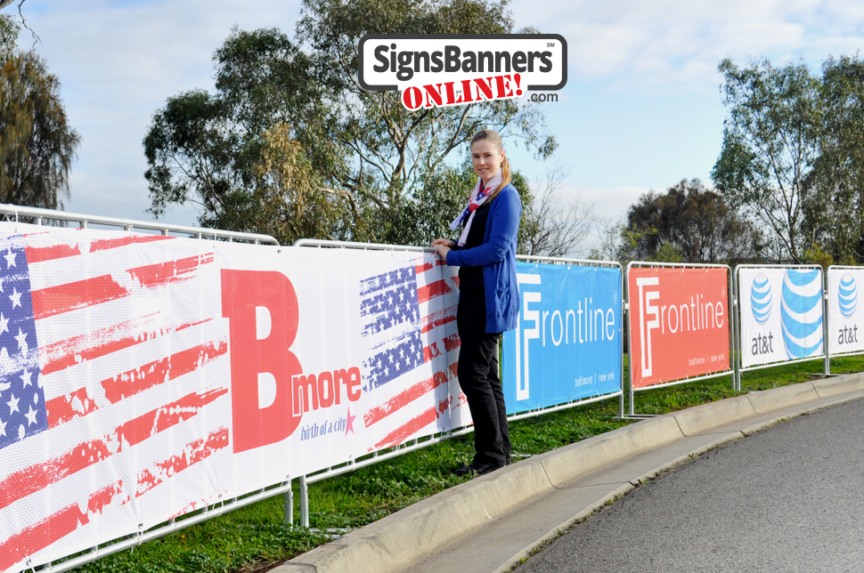 Sequence of US event sponsors fitted to the temporary crowd control steel barricades. Frontline, Baltimore B More, AT&T