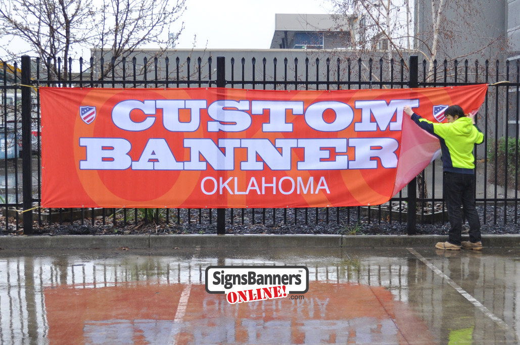 All weather banners, the banner sign is in the rain or snow.