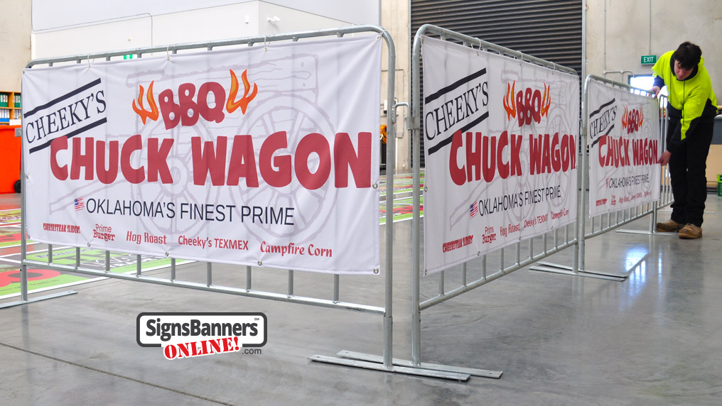 Set of printed banner signs showing the printing capability and artistic example that custom banner signage gives. The wagon in the background, big bold text and small food logos invite the reader very well. This example shows many features that Signs Banners Online give their Oklahoma customers.