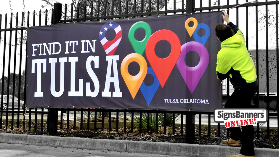 A new custom print for Tulsa banner signage, Man with sign outside.