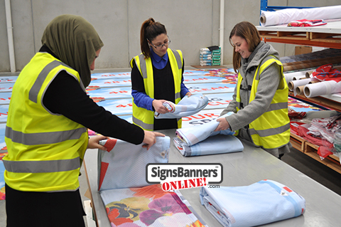 Team making banner signs in the factory West Virginia Morgantown example