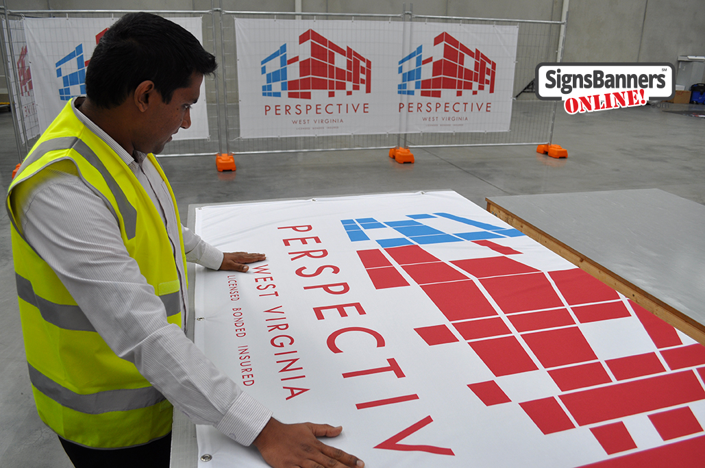 Perspective banner signs on table and fence