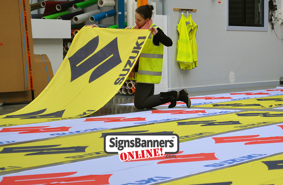 Suzuki banner signs printed and inspection for Wyoming Casper example